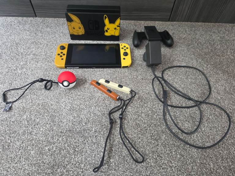 Nintendo Switch Pikachu Edition with Accessories – Good Condition