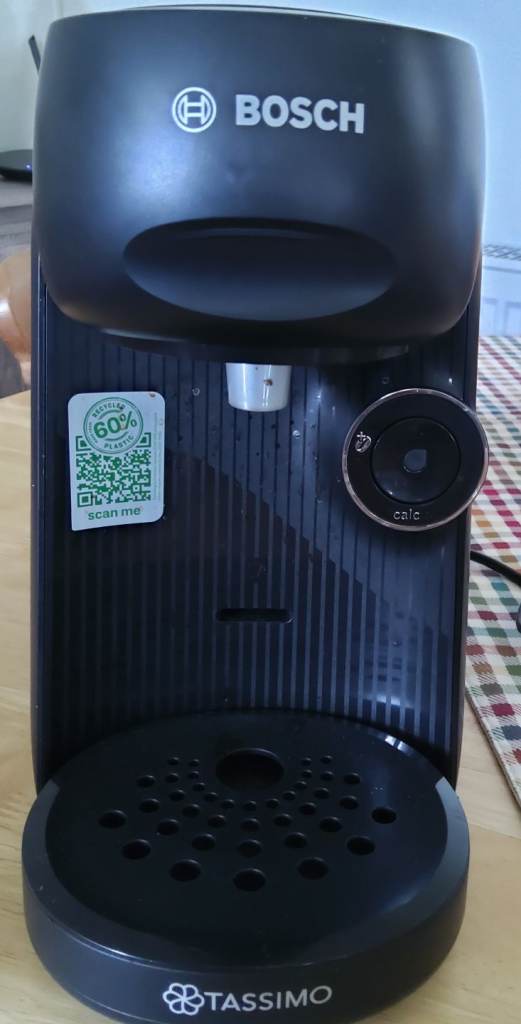 Bosch tassimo coffee machine with coffee and milk pods