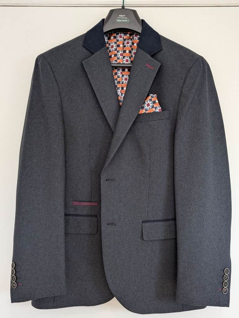 Men's suit from Next. Good as new. Jacket 38S trousers 32R