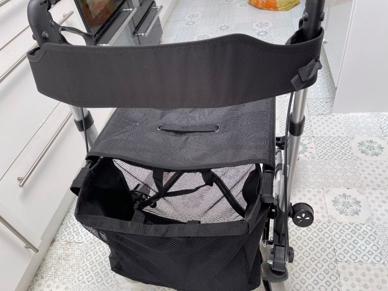 Walker with comfy seat.