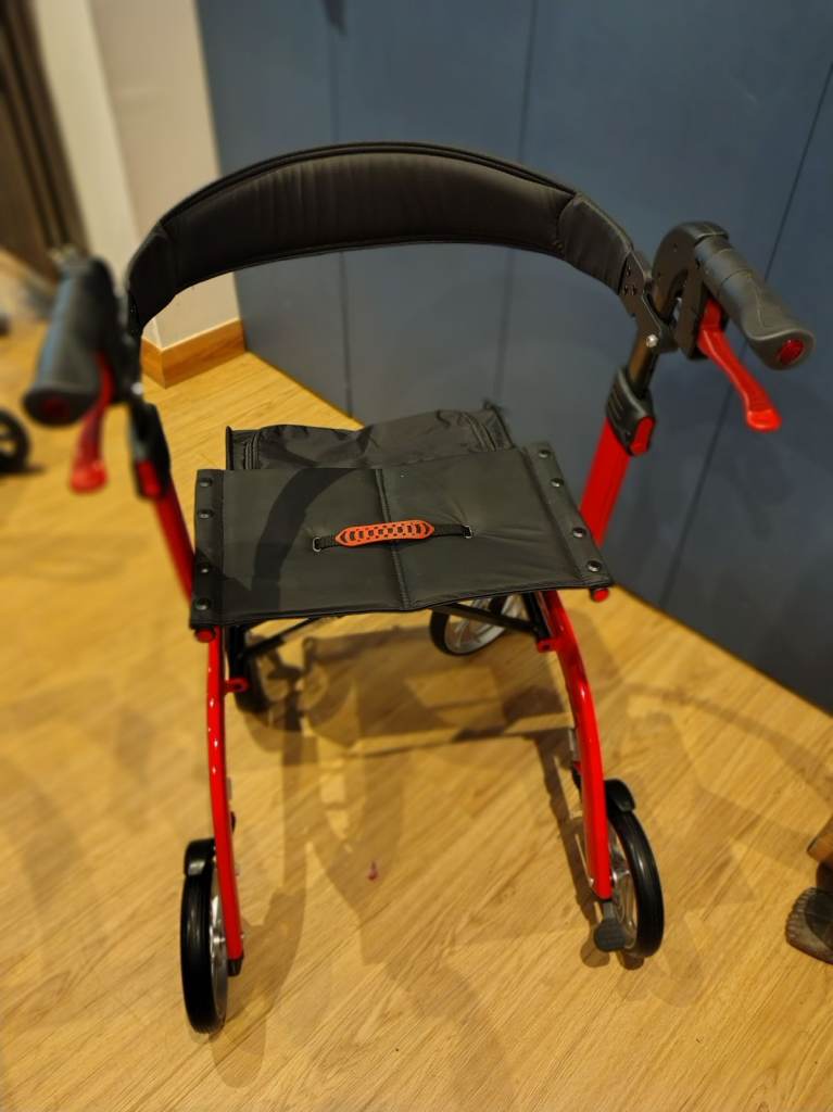Drive Medical Nitro 4 wheeled Rollator with seat.