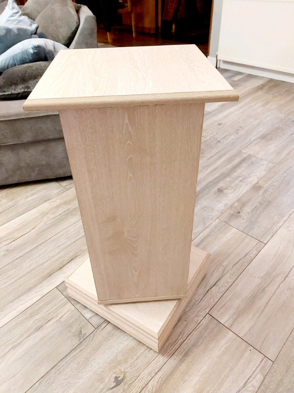 Solid limed oak CD unit on swivel pillar base 