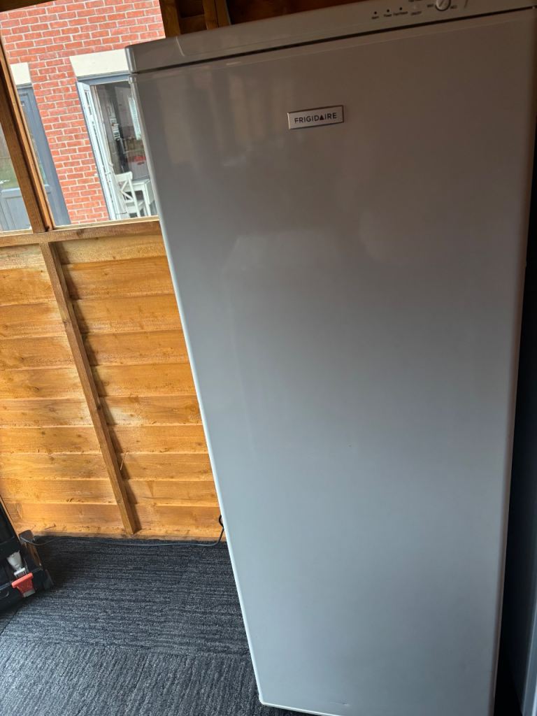 Tall Frigidaire Freezer.