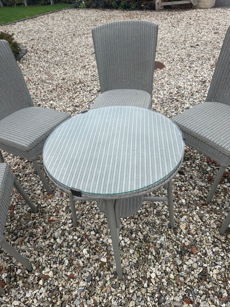 Lloyd Loom table and chairs 