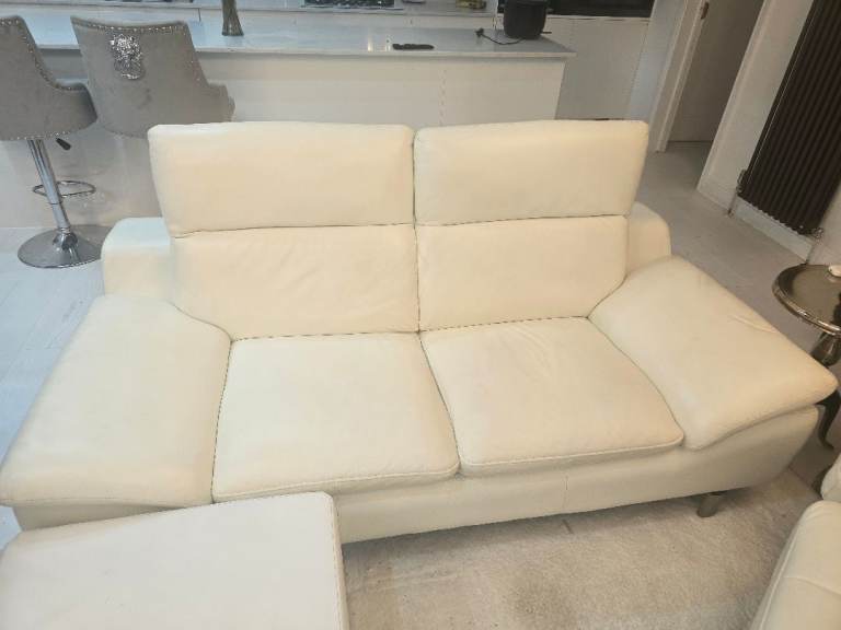 Cream leather sofa and footstool with storage
