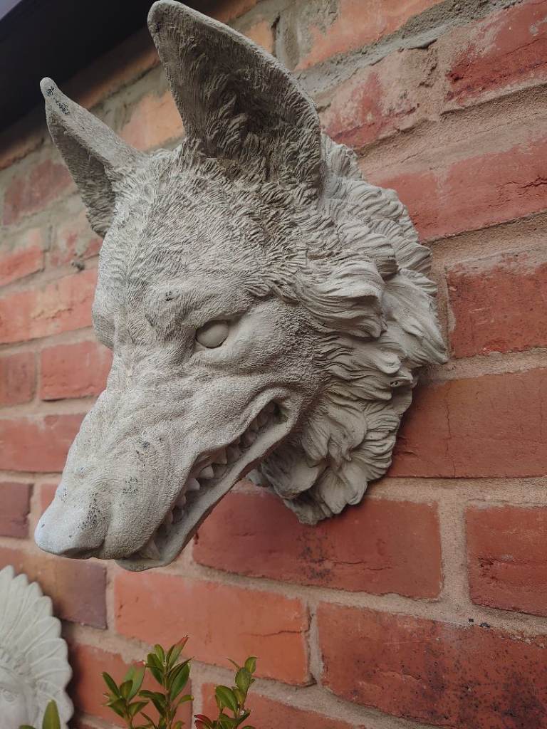 Cast wolf head