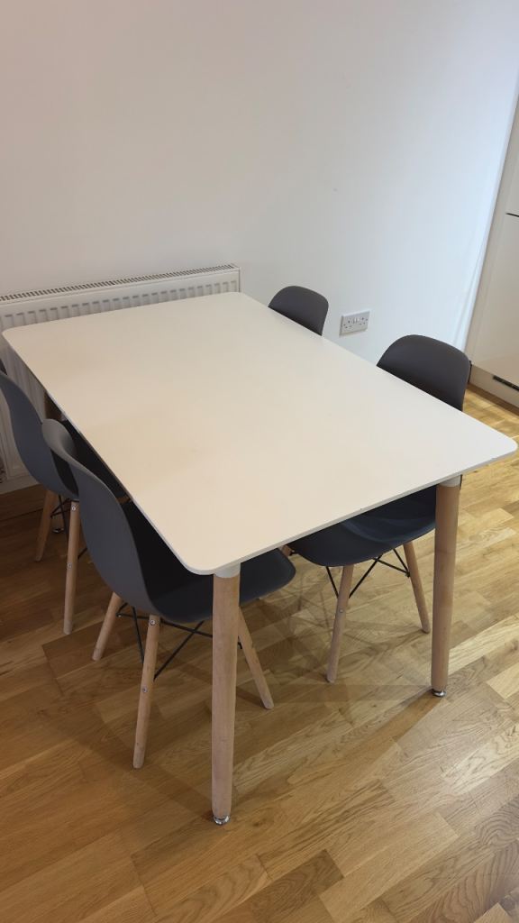 Modern Dining Table with 4 Grey Chairs – Good Condition