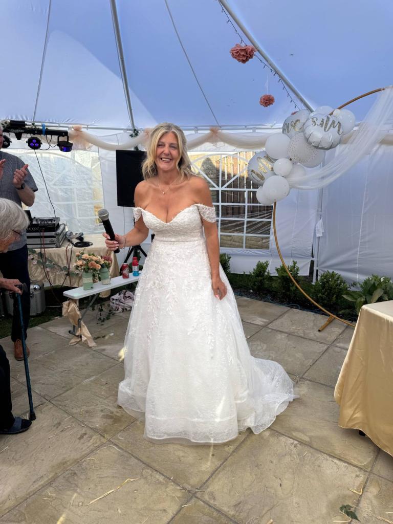 Ivory wedding dress size 8-14 (corset back)