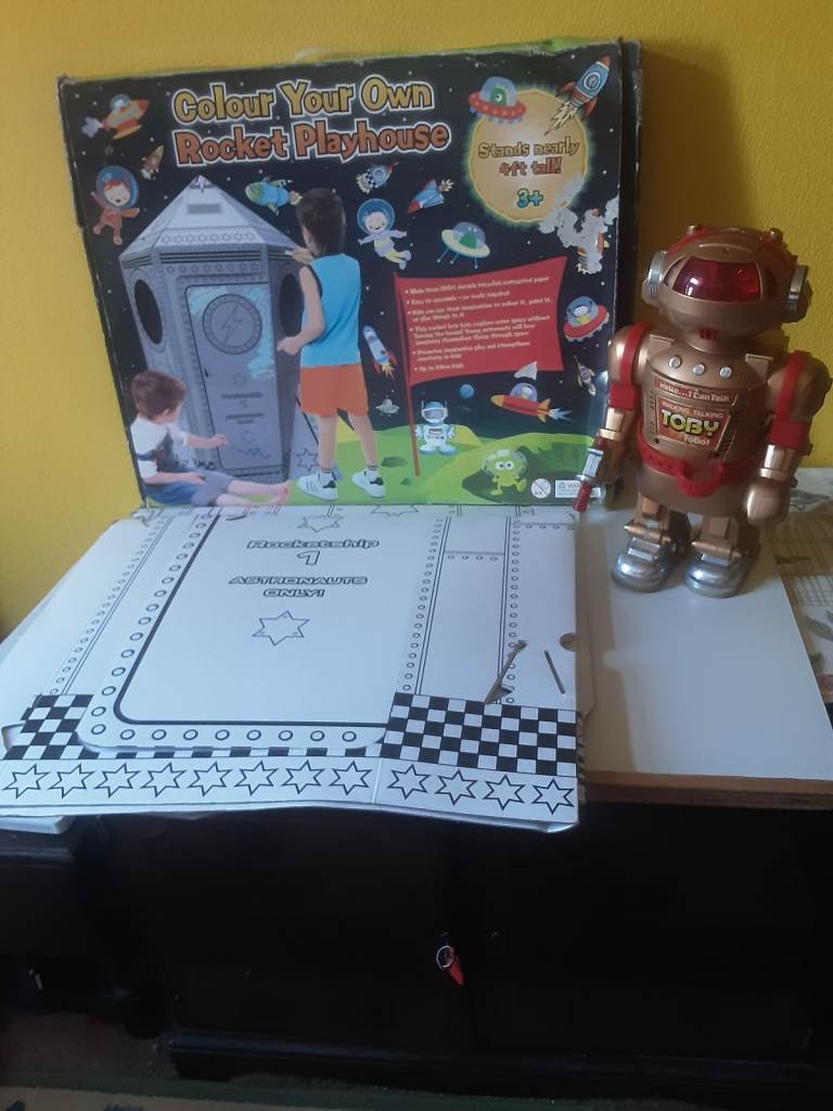 Childs rocket playhouse  .and Toby the robot lights and sounds. 