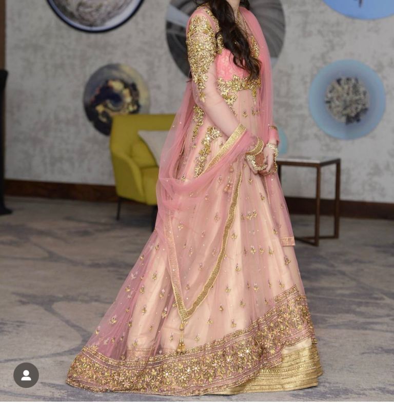 Pink wedding dress with trail 
