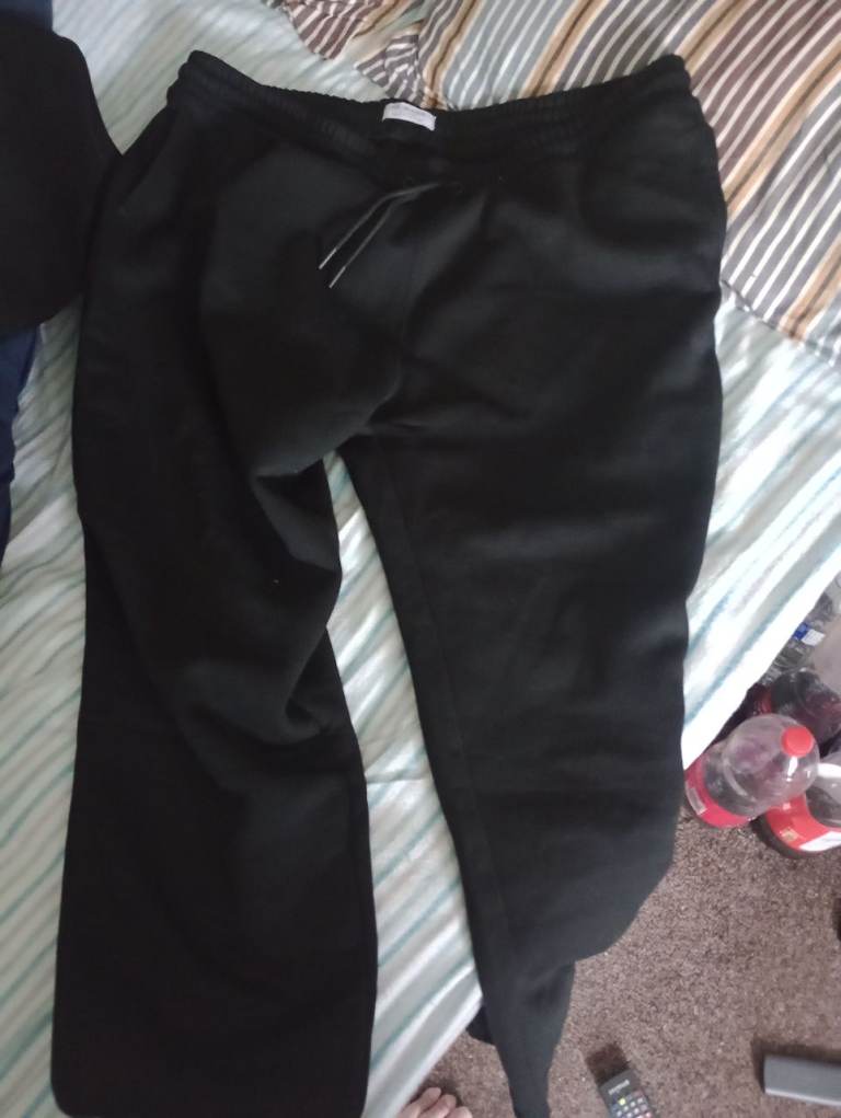 Two mens tracksuit bottoms free