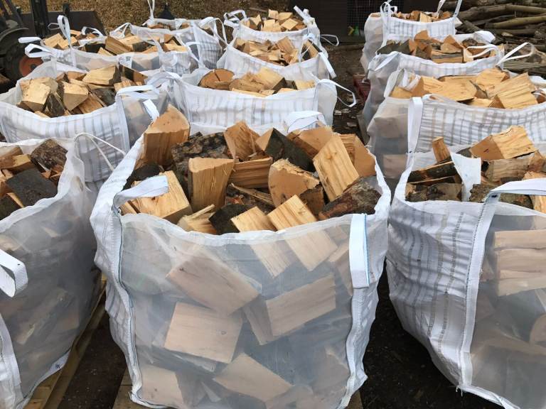 Air dried logs 1 ton bags free delivery 