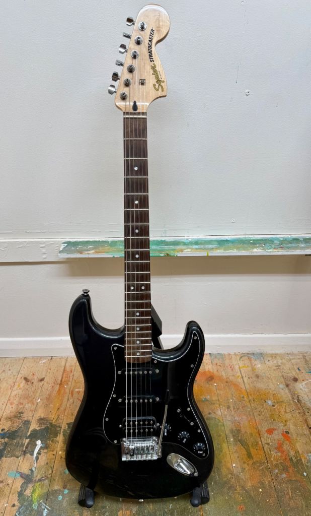Squire by Fender Stratocaster Electric Guitar.