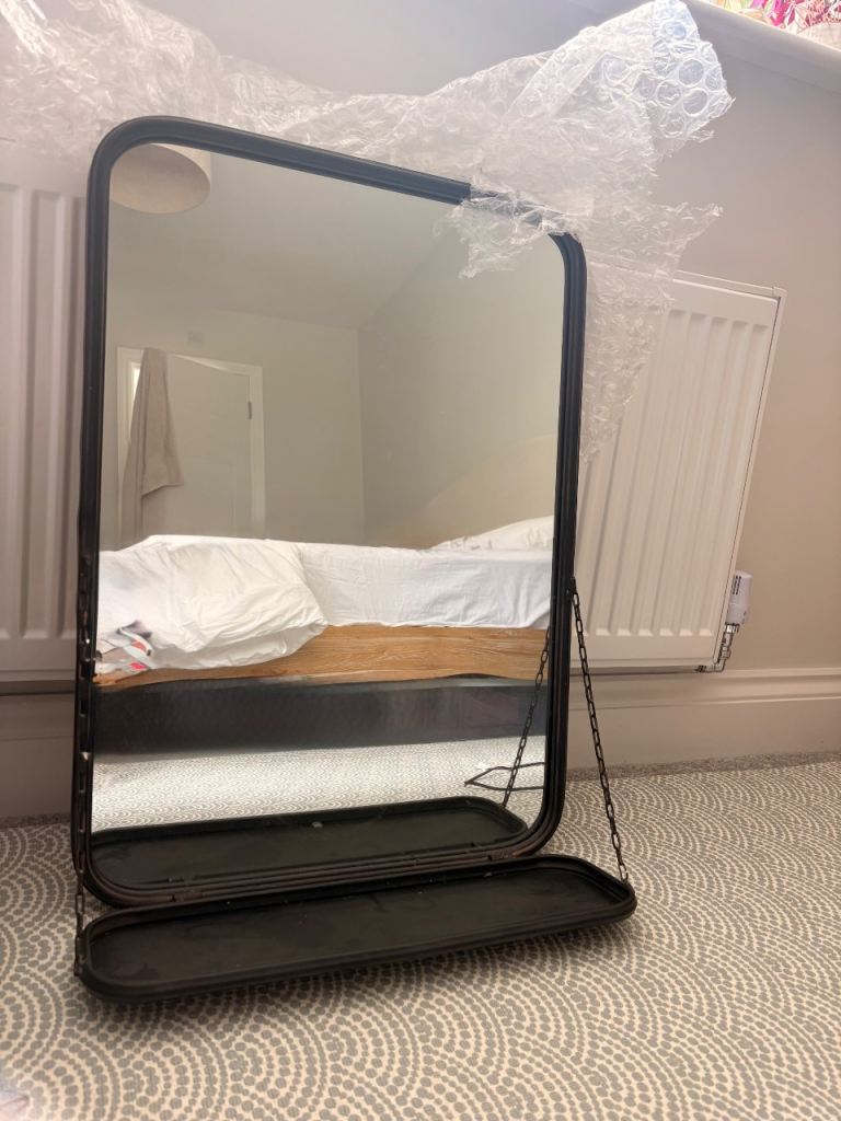 Black mirror with shelf