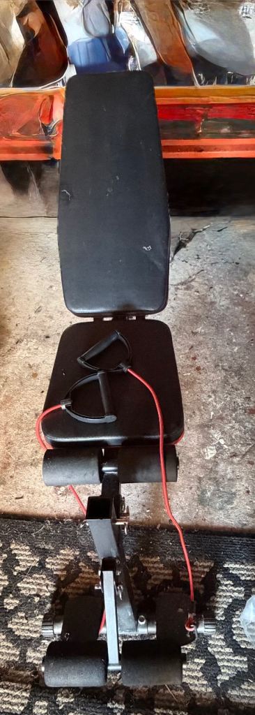 Exercise Bench plus cast iron weights, bars, dumbbell bars