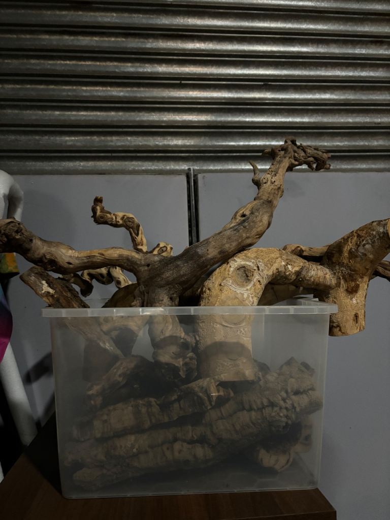 Large box of drift wood ornaments for vivarium