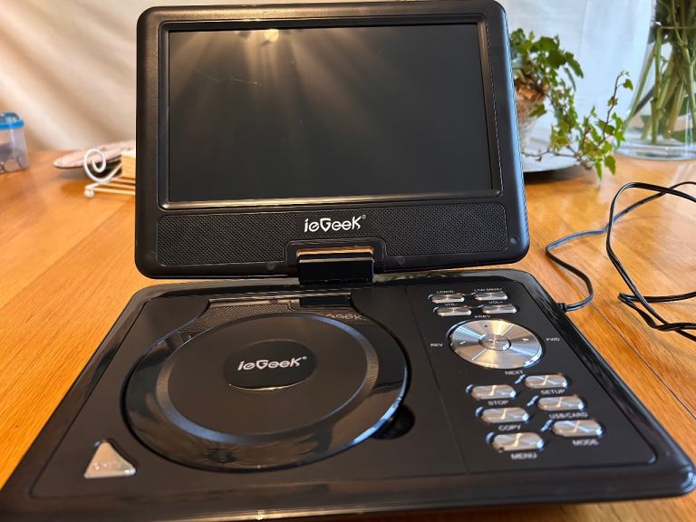 Portable DVD player & 36 kids DVDs-excellent condition 