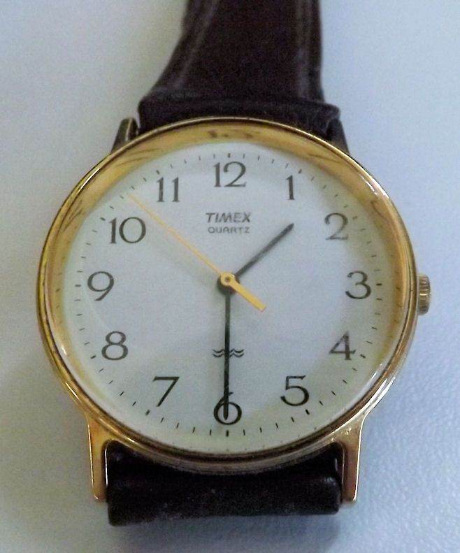 VINTAGE TIMEX QUARTZ WATCH WITH GOOD QUALITY BROWN LEATHER STRAP G.W.O.