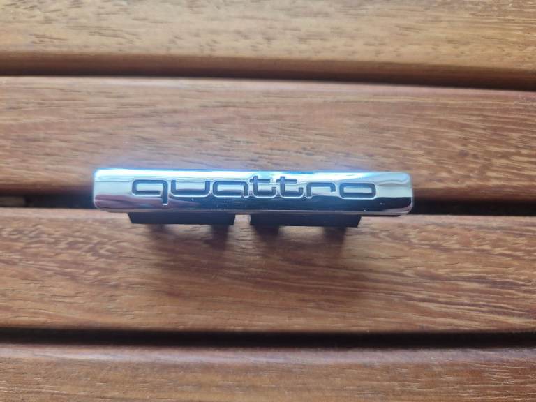Genuine Audi quattro Chrome Badge Emblem – OEM – Excellent Condition