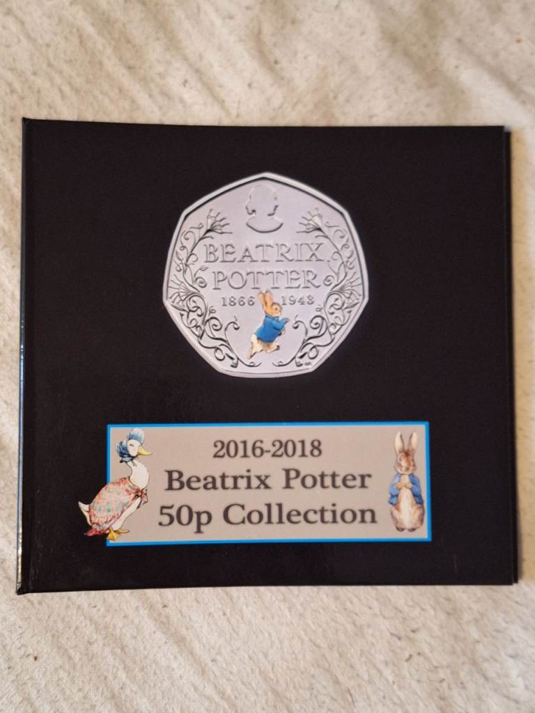 50p coin collection in original colour with book 