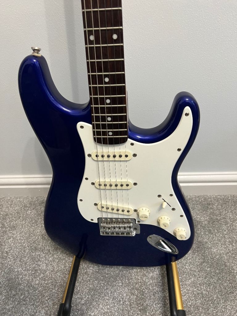 Blue Stratocaster by squier great condition 
