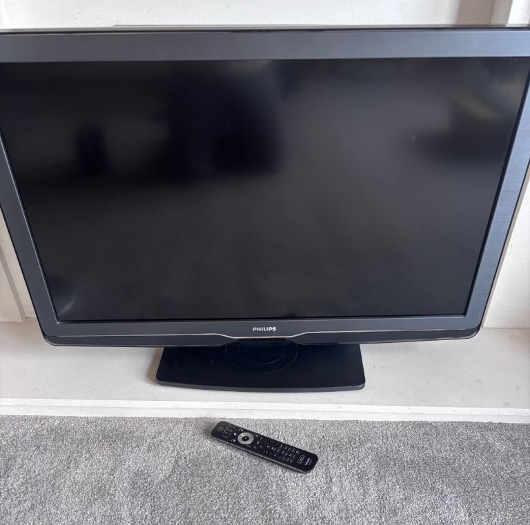 Philips Black Flat Screen TV with Remote – Good Condition