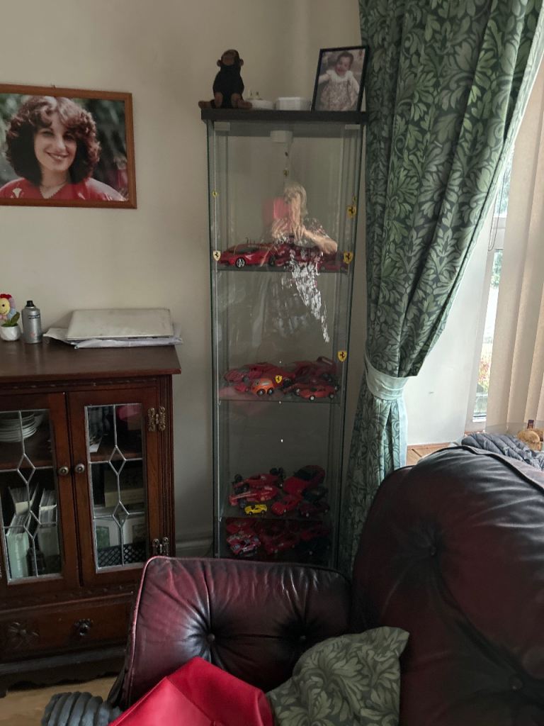 Tall glass Display case