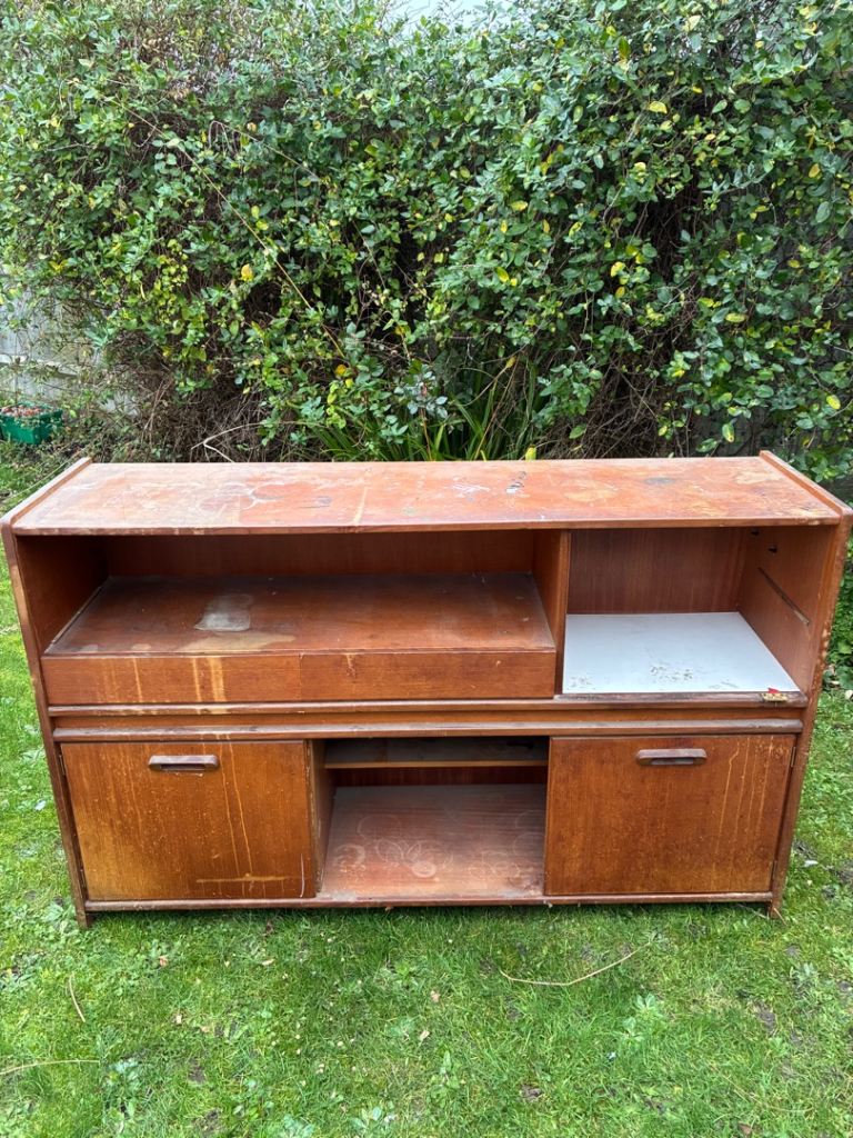 A solid wood unit used for a workshop tools materials storage unit on casters / wheels