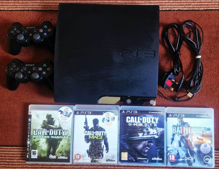 PlayStation 3 Slim with 2 controllers