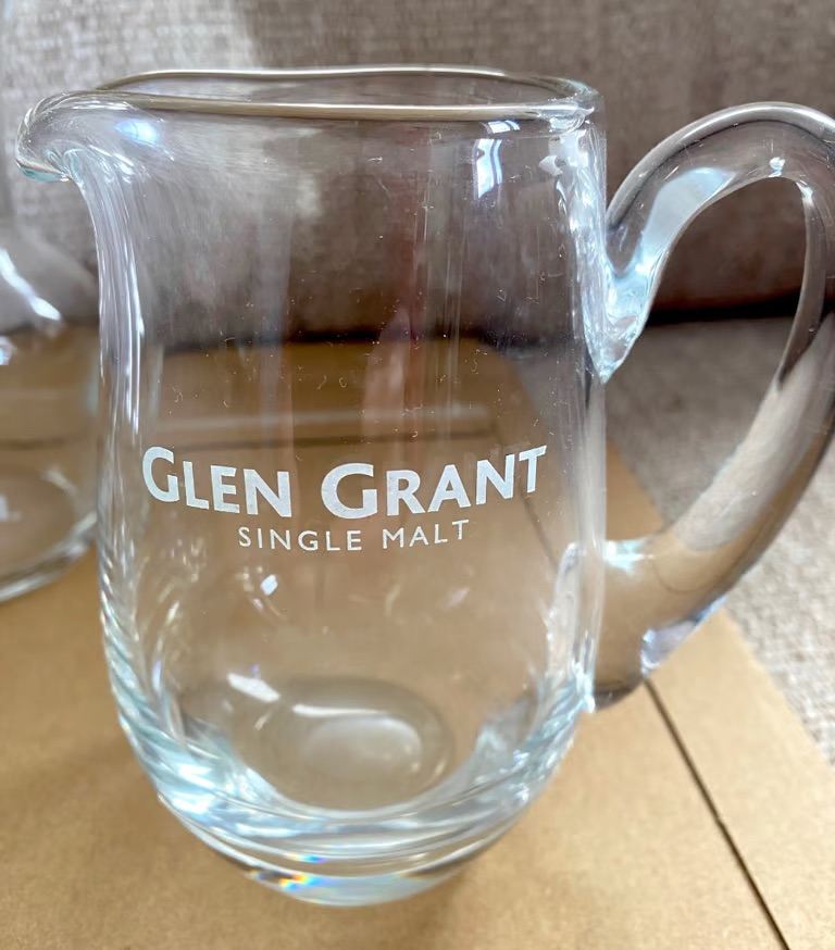 Various Scotch Whisky collectibles. Nosing glasses, water jugs etc. 