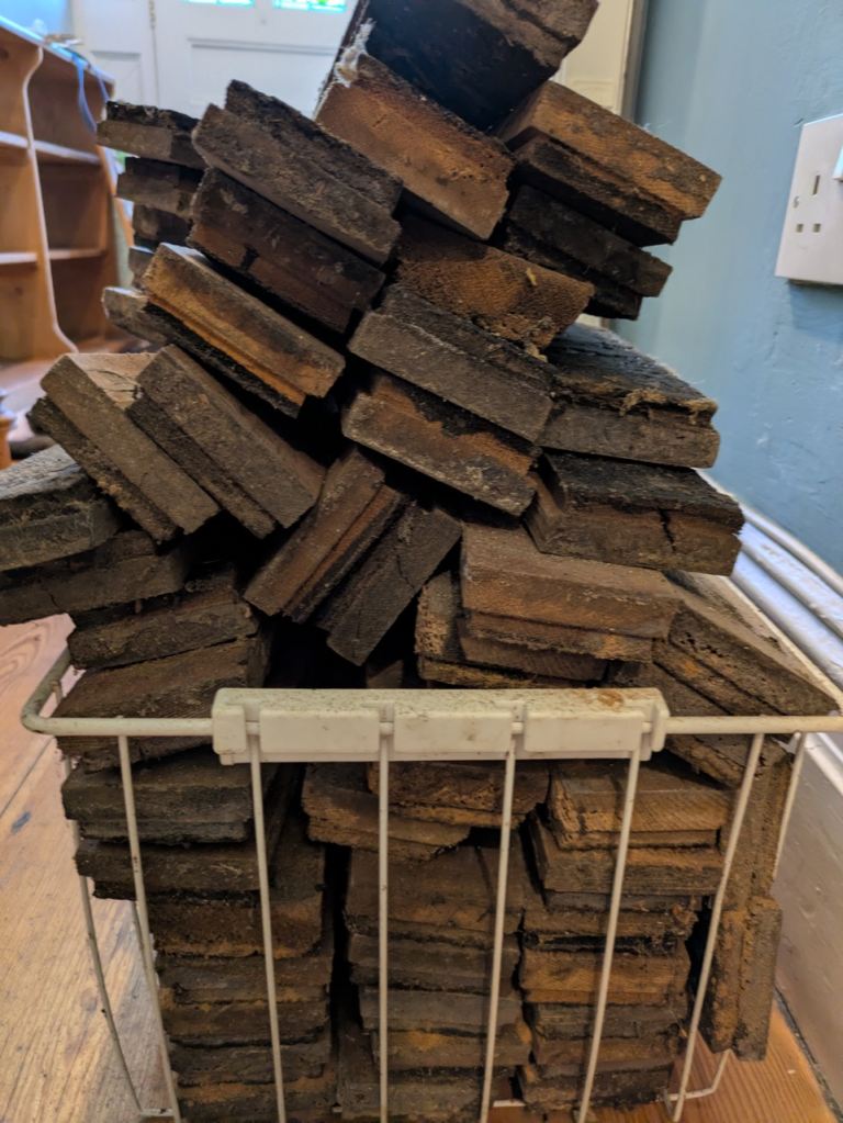 small crate of old wooden parquet flooring