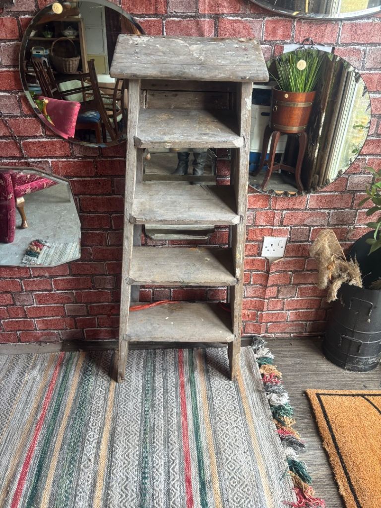 A Vintage wooden step ladder wedding decor/garden display