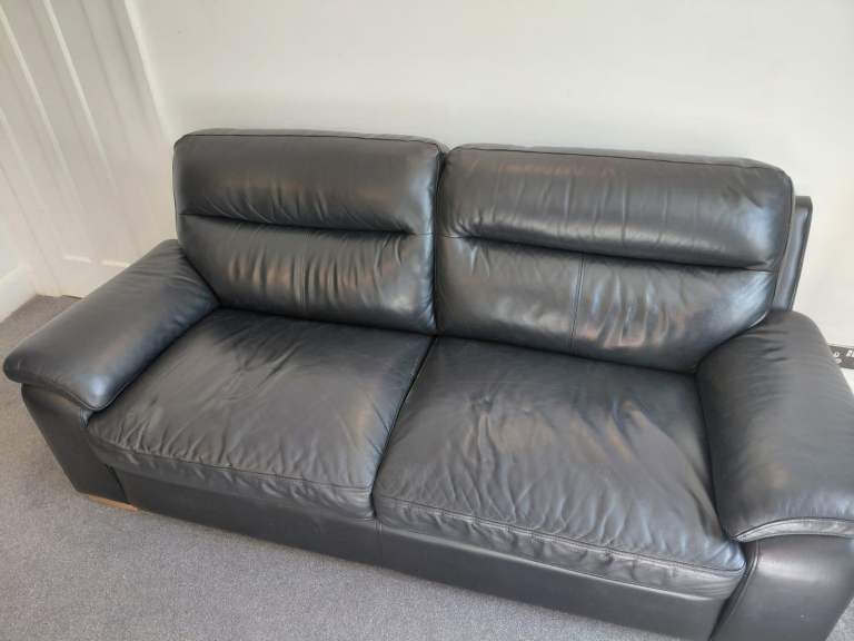 Black Leather Two-Seater Sofa – Good Condition