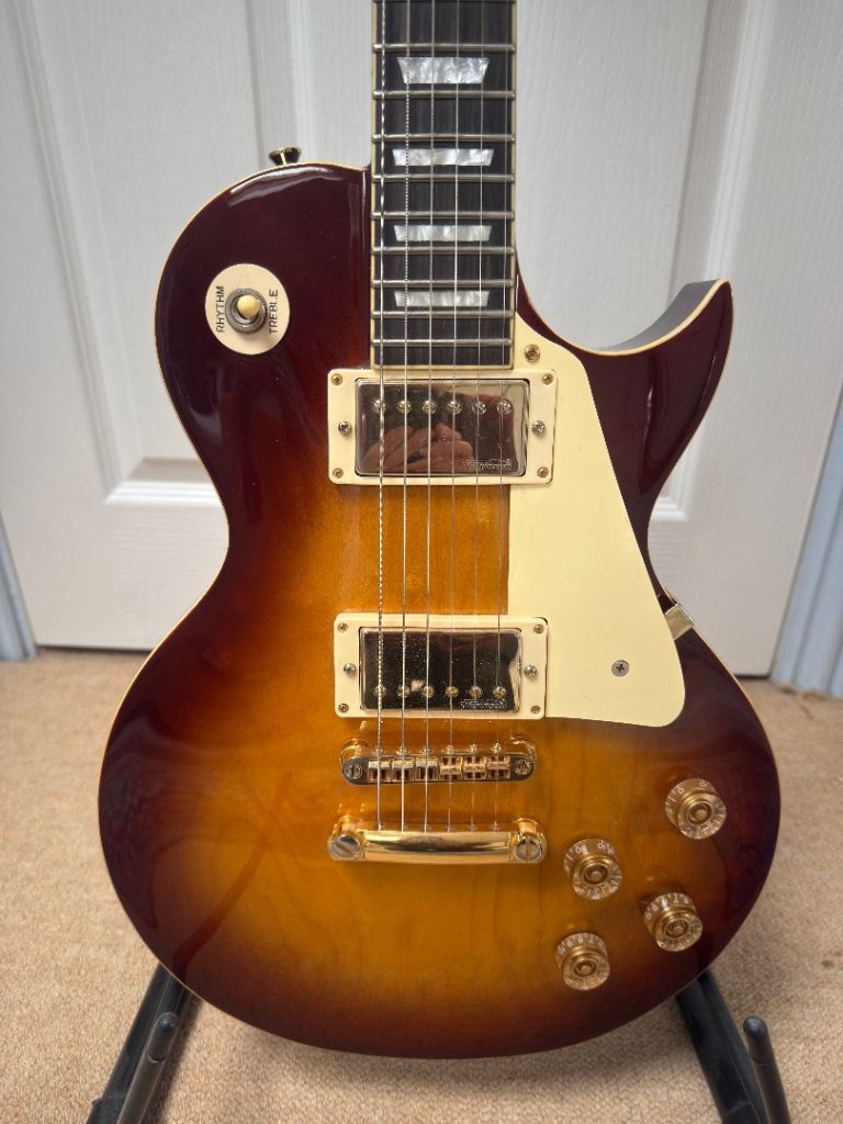 vintage v100 tobacco sunburst ReIssued Electric Guitar ~  Fair Deal Music 22 Medium profile frets add to the comfort Vintage V100 Series Electric Guitars