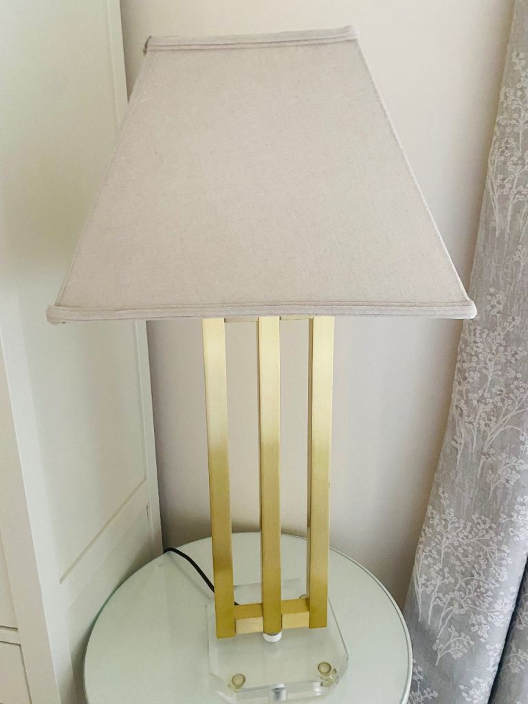 Elegant gold lamp with linen effect shade