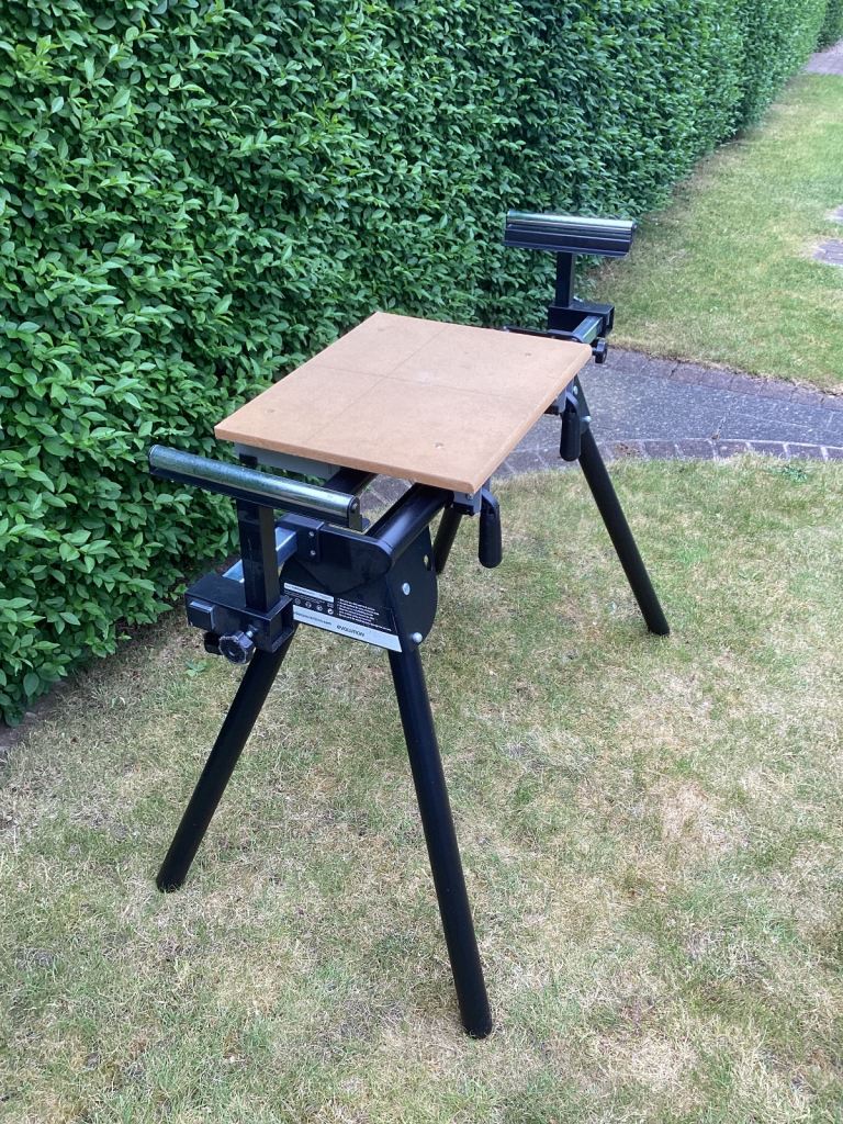 Evolution mitre saw stand with extendable and height adjustable supports.