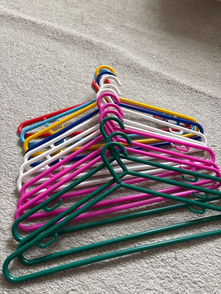 Plastic Clothes hangers x 13, all same style 