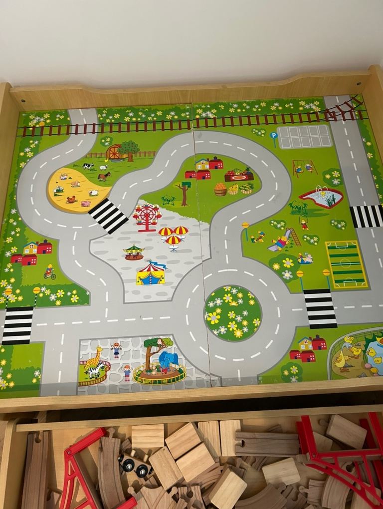 Wooden train table and storage