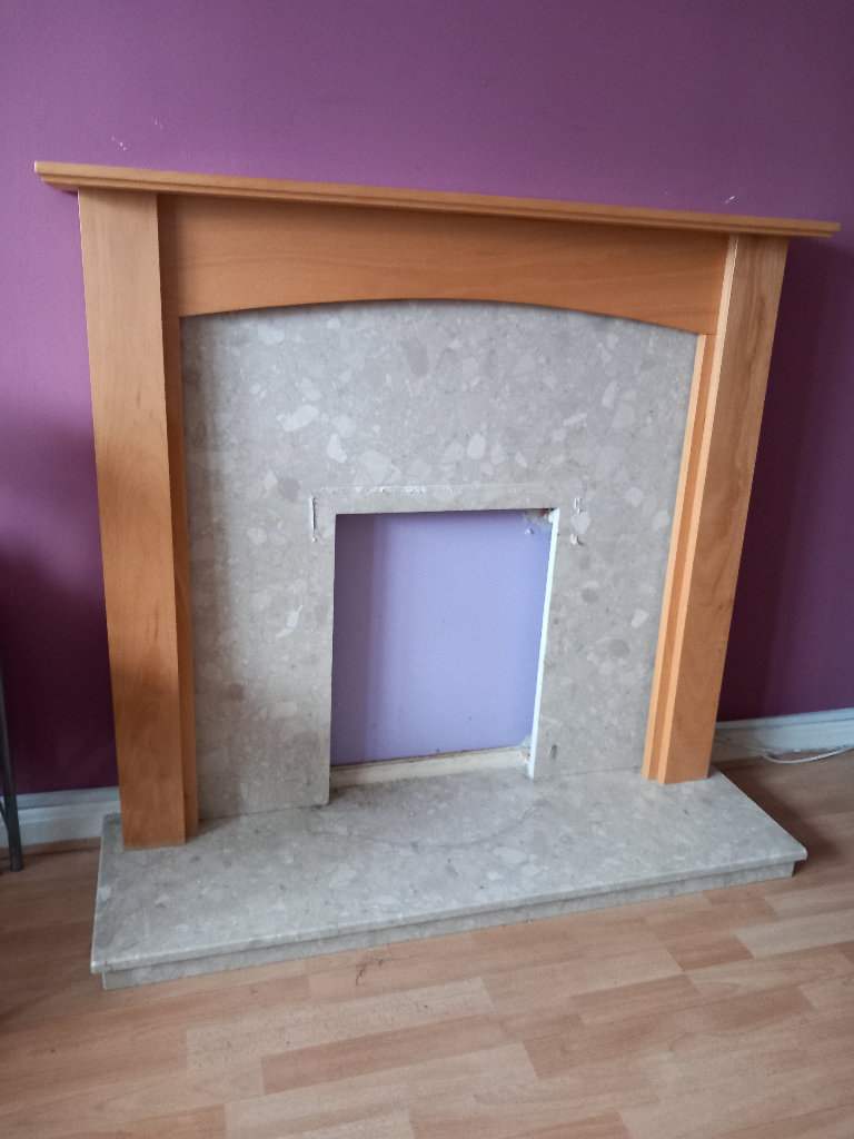 Fire Surrounding beach coloured and cream coloured marble back