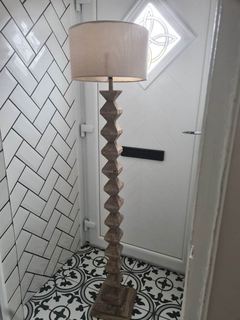 Solid heavy unusual floor lamp with textured ivory shade 