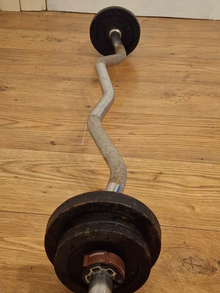 Curved barbell with cast iron weights