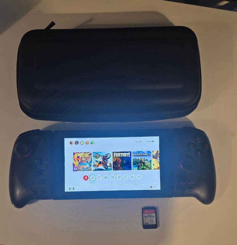Nintendo Switch, Carry Case & Super Smash Bros