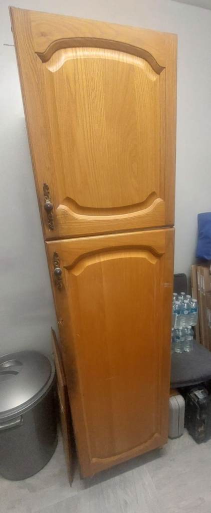 Kitchen larder unit. Brown oak wood. 194cm height  Depth 60 cms width 50cms