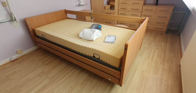 Adjustable Medical Bed with Mattress - Good Condition