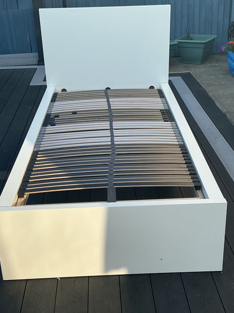 Two White Single Bed Frames with Wooden Slats and Storage Drawers