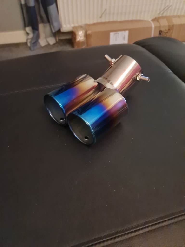 Double look tailpipe extension 