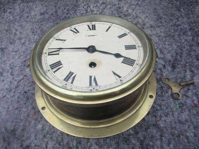Ship's Clock by FW Elliott in working condition.