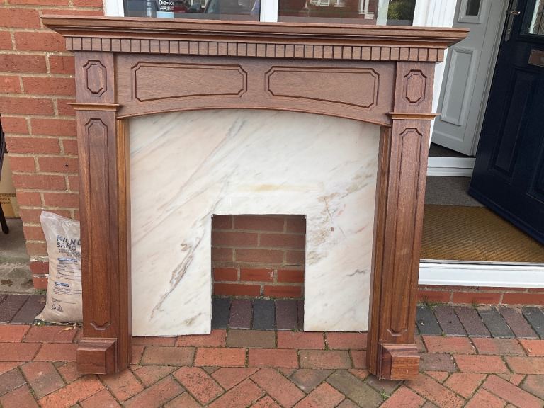 Mahogany fire surround with real marble back and hearth