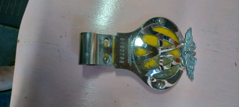 AA vintage badge
