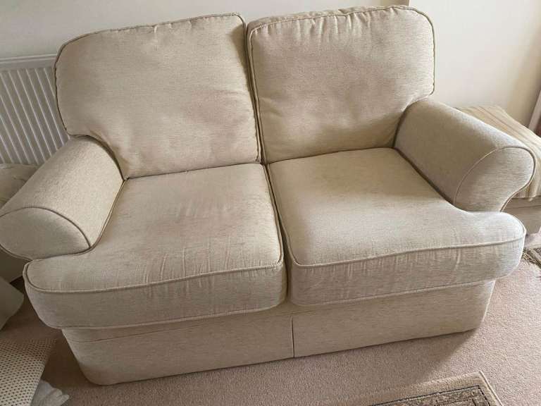 2 Sofas and an Armchair